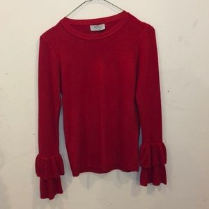 529 long sleeve ruffle cuff knit top.